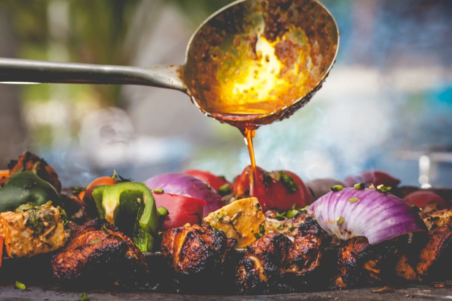 Tandoor cooking finished over fire